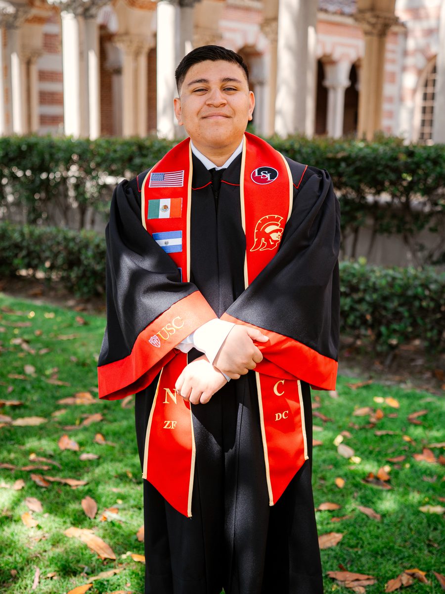 Nathan Castillo in USC regalia on campus